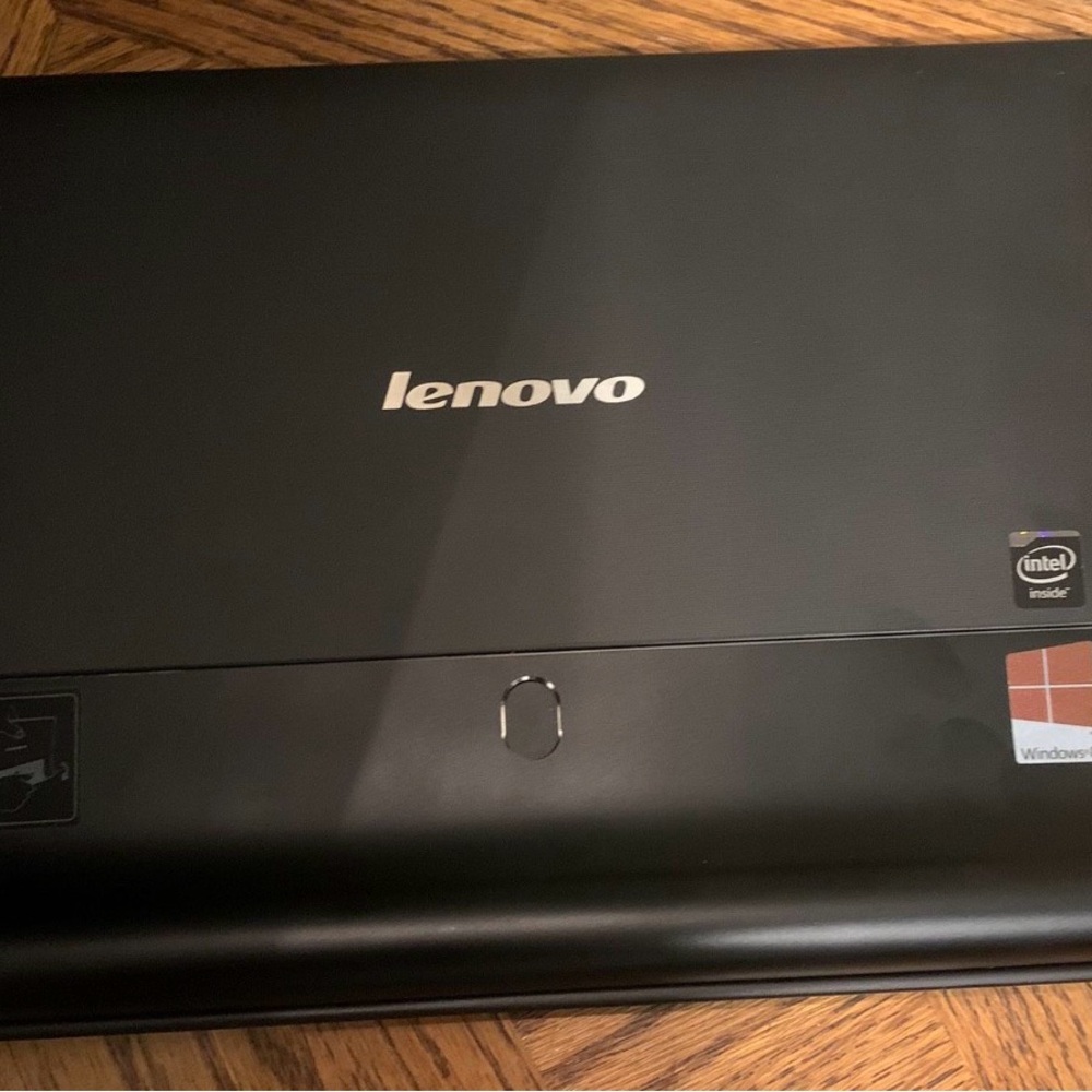 Lenovo Black Laptop with Silver Logo